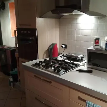 Отель Fienile Ristrutturato Azzago